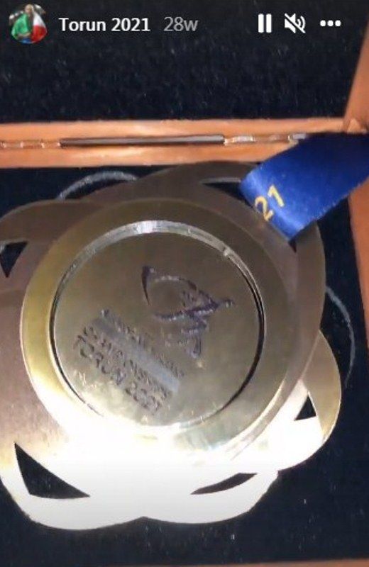 Lamont Marcell Jacobs showing the gold medal he won at the 2021 European Athletics Indoor Championships in an Instagram story