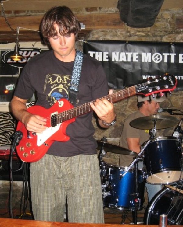 Matthew Rutler in concert with the band Nate Mott in 2009