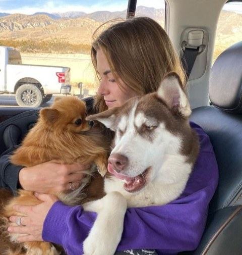 KJ Apa's girlfriend, Clara Berry, with his pet dogs
