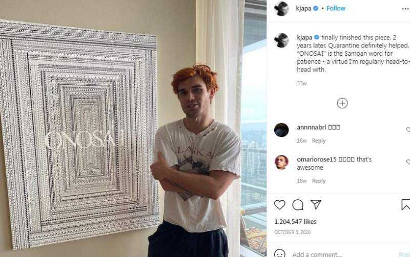 KJ Apa's Instagram post showing him standing next to his Samoan piece of art
