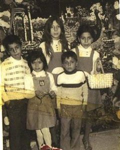 Cathy Sarraï in childhood with her siblings