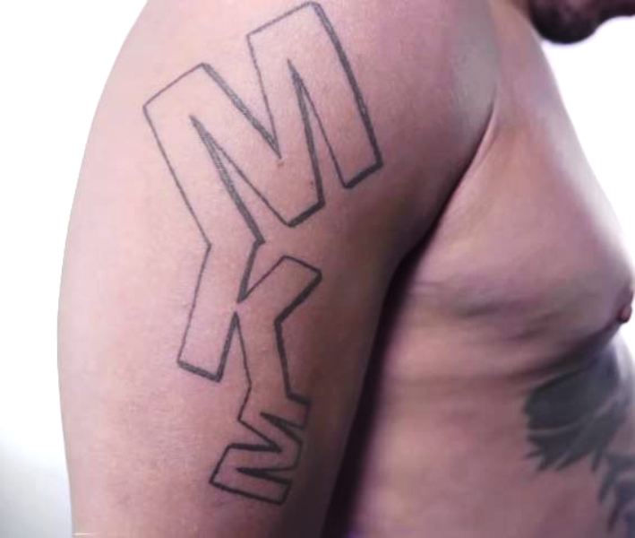 Joey Starr's MKM tattoo