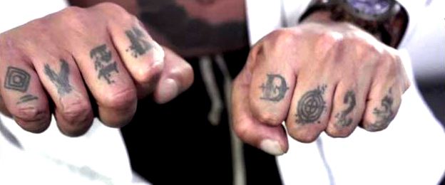 Joeystarr's finger tattoos