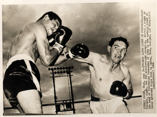 A photo of Gene Fullmer and Florentino Fernández in action