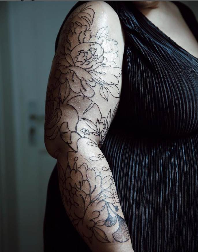 The floral tattoo on the arm of Stephanie Zwicky