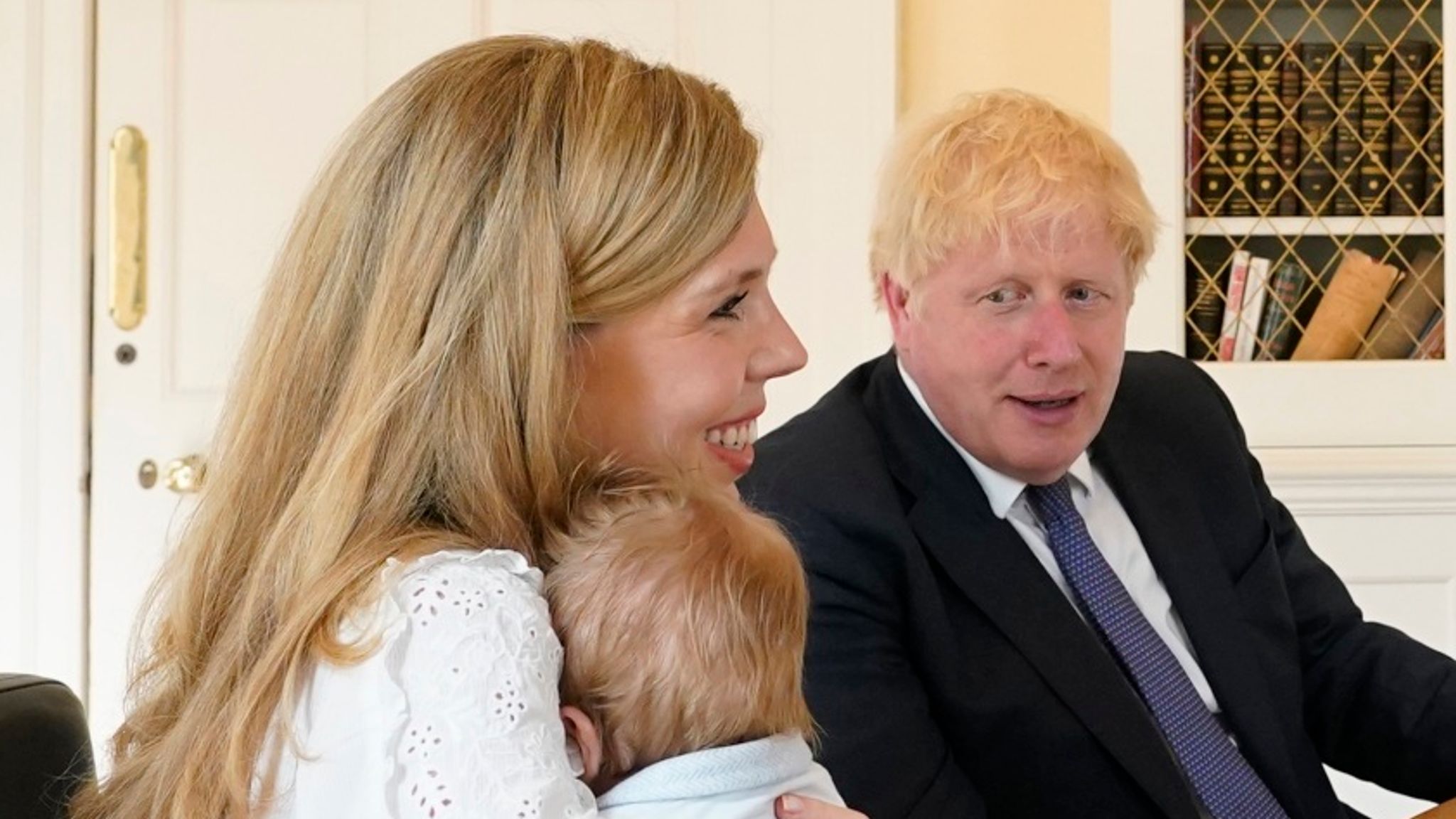 Carrie Symonds and Boris Johnson with their son