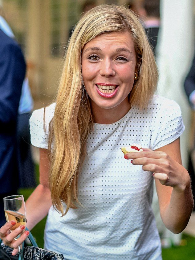 A photo of Carrie Symonds with a drink