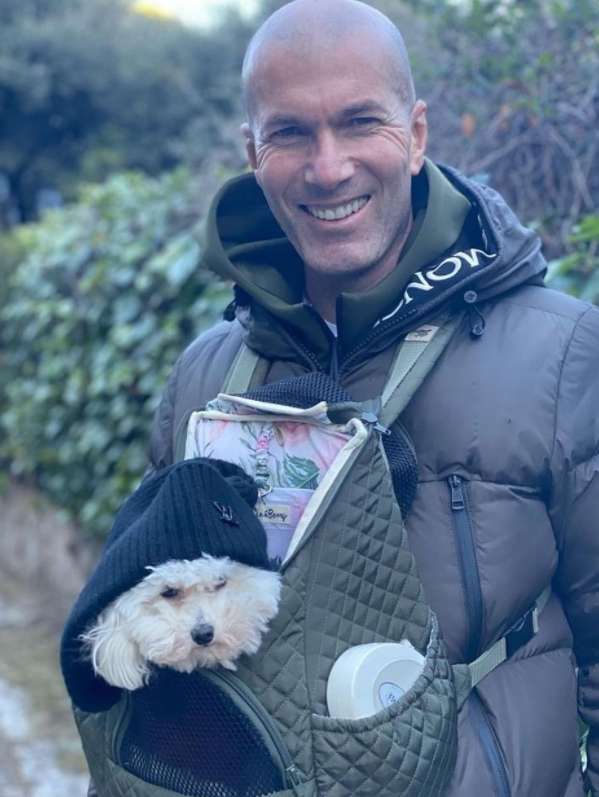 Zinedine Zidane with his pet dog Eros