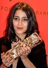 Bekhti with her Cesar Award for Most Promising Actress for All That Glitters