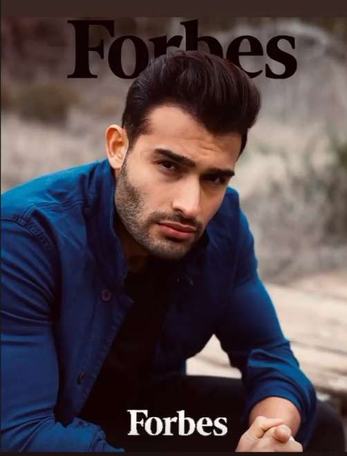 Sam Asghari posing for Forbes Magazine