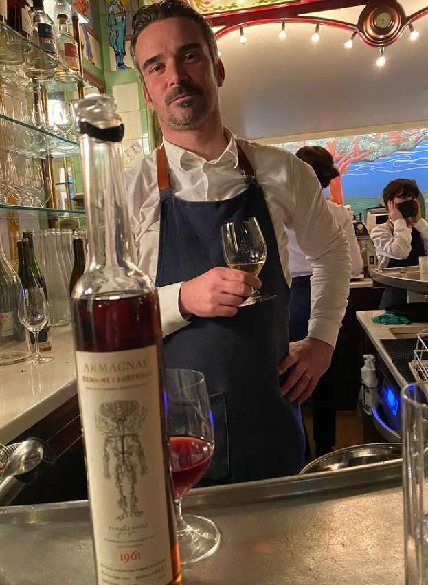 Slimane Dazi drinking wine