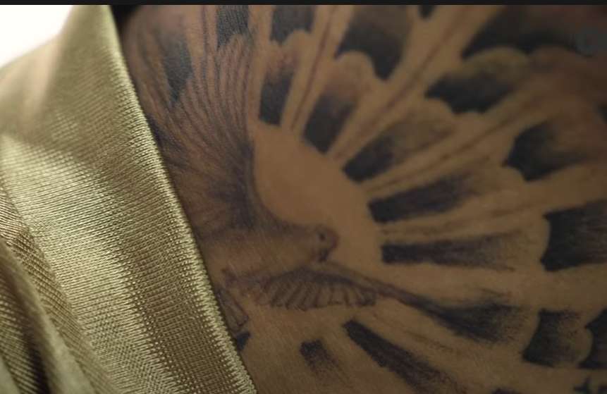 Zola's dove tattoo