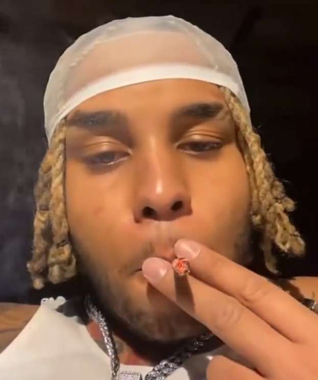 A photo of Zola smoking