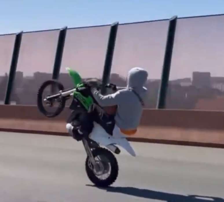 Zola does a bike stunt-