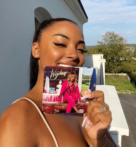 Wejdene holding his autographed DVD