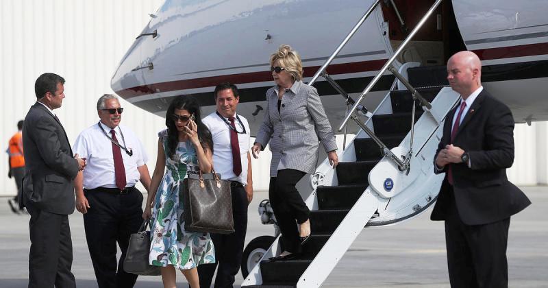 Hillary Clinton and her aide Huma Abedin on her campaign plane at Van Nuys Airport in Van Nuys, California